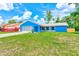 Charming single-story home with a well-maintained lawn at 2063 De Carlo Ave, Spring Hill, FL 34608