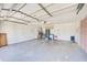 Spacious two-car garage with ample room for parking and storage, ready for customization to fit your needs at 2063 De Carlo Ave, Spring Hill, FL 34608