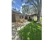 Charming single-story home with stone accents, double front doors, and mature landscaping at 2102 Doefield Ct, Valrico, FL 33596
