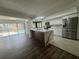 Modern kitchen with stainless steel appliances and a breakfast bar at 2102 Doefield Ct, Valrico, FL 33596