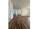Spacious living room featuring wood floors and open concept layout at 2102 Doefield Ct, Valrico, FL 33596