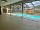 Screened-in pool offers an ideal spot for relaxation and recreation, enhanced by a spacious outdoor patio at 2102 Doefield Ct, Valrico, FL 33596