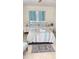 Stylishly decorated bedroom with a comfortable bed and modern furniture at 2120 W Virginia Ave, Tampa, FL 33607