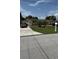 Charming single-story home with well-maintained lawn and landscaping at 2120 W Virginia Ave, Tampa, FL 33607