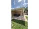 Outdoor hot tub in covered patio area, perfect for relaxation at 2120 W Virginia Ave, Tampa, FL 33607