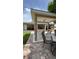 Inviting outdoor patio area with comfortable seating and hot tub in the background at 2120 W Virginia Ave, Tampa, FL 33607
