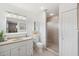 Modern bathroom with updated vanity, shower, and neutral decor at 21906 Shamu Dr, Land O Lakes, FL 34639