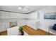 Bonus room featuring bright lighting, custom cabinetry and desk space at 21906 Shamu Dr, Land O Lakes, FL 34639