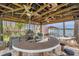 Outdoor grill with bar, ceiling fans and waterfront views at 21906 Shamu Dr, Land O Lakes, FL 34639