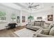 Spacious bonus room featuring hardwood floors and ample natural light at 2604 W Jetton Ave, Tampa, FL 33629