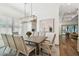 Dining room with a wood table, upholstered chairs, and art on the wall at 2604 W Jetton Ave, Tampa, FL 33629