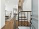 Grand foyer featuring a wood staircase, hardwood floors, and views into the dining room at 2604 W Jetton Ave, Tampa, FL 33629