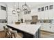 Modern kitchen with an oversized island, pendant lights, and stainless steel appliances at 2604 W Jetton Ave, Tampa, FL 33629