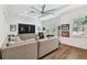 Spacious living room with hardwood floors and modern decor at 2604 W Jetton Ave, Tampa, FL 33629