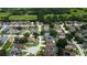 Aerial shot displays an expansive community with mature trees, well-manicured lawns, and diverse home styles at 28826 Windover St, Wesley Chapel, FL 33545