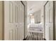 Bright bedroom with vaulted ceiling features wood-look flooring, ceiling fan, and natural light at 28826 Windover St, Wesley Chapel, FL 33545
