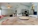 Eat-in kitchen next to living room at 28826 Windover St, Wesley Chapel, FL 33545