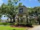 Inviting entrance to the community with well-maintained landscaping and a distinctive sign at 28826 Windover St, Wesley Chapel, FL 33545
