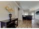 Inviting foyer with stylish console table leading into the living area at 28826 Windover St, Wesley Chapel, FL 33545
