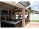 Inviting covered patio with outdoor seating, ceiling fan, and ample space at 28826 Windover St, Wesley Chapel, FL 33545