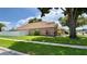 A beautiful single-Gathering home featuring a well-maintained yard and landscaping at 28826 Windover St, Wesley Chapel, FL 33545