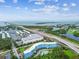 Aerial view of a condominium complex, a marina, and highway access at 3315 58Th S Ave # 311, St Petersburg, FL 33712