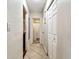 Hallway leads to multiple rooms and features a bathroom entrance and closet space at 3315 58Th S Ave # 311, St Petersburg, FL 33712