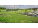 View of the ground mounted solar panel array installed in the rear yard at 3505 Medulla Rd, Plant City, FL 33566