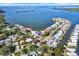 Aerial view of neighborhood offers easy access to the water from private docks and easy street access at 4173 85Th N St, St Petersburg, FL 33709