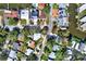 Aerial view of a neighborhood with houses, roads, and the property outlined in red at 4173 85Th N St, St Petersburg, FL 33709