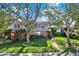 Charming two-story home features well-manicured landscaping and brick accents at 4173 85Th N St, St Petersburg, FL 33709