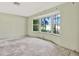 Spacious living room with a bay window, offering natural light and scenic views at 4173 85Th N St, St Petersburg, FL 33709
