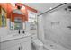 Bright bathroom with walk in shower, modern finishes, and updated vanity at 4637 4Th N Ave, St Petersburg, FL 33713