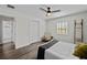 Bedroom with chair, windows, and en suite bath at 4637 4Th N Ave, St Petersburg, FL 33713
