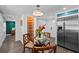 Cozy dining area with a glass table, and shelving at 4637 4Th N Ave, St Petersburg, FL 33713