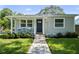 Charming single-story home with a well-manicured lawn and inviting front porch at 4637 4Th N Ave, St Petersburg, FL 33713