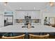 Modern kitchen featuring a large center island and stainless steel appliances at 4637 4Th N Ave, St Petersburg, FL 33713