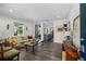 Cozy living room featuring hardwood floors and an open concept kitchen at 4637 4Th N Ave, St Petersburg, FL 33713