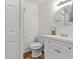 Bathroom featuring a toilet and white vanity with mirror at 4945 91St N Ave # 30, Pinellas Park, FL 33782