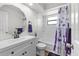 Bathroom featuring a shower/tub combo and a vanity at 4945 91St N Ave # 30, Pinellas Park, FL 33782