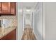 Hallway displaying wood floors and closet space at 4945 91St N Ave # 30, Pinellas Park, FL 33782