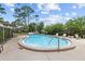 Serene pool includes lounge chairs with room to relax and enjoy the weather at 4945 91St N Ave # 30, Pinellas Park, FL 33782
