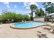 Beautiful pool features several lounge chairs perfect for residents to relax and enjoy a summer afternoon at 4945 91St N Ave # 30, Pinellas Park, FL 33782