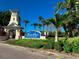 Community entrance showcasing the Mirabay sign with lush landscaping and a charming gatehouse at 511 Winterside Dr, Apollo Beach, FL 33572