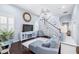 Bright living room featuring a TV, decor, and a staircase, creating a welcoming atmosphere for Gathering and guests at 511 Winterside Dr, Apollo Beach, FL 33572