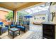 Screened in patio featuring comfortable seating, pavers and a hot tub for relaxation at 511 Winterside Dr, Apollo Beach, FL 33572
