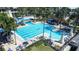 Stunning resort style pool with lap lanes, freeform pool, water slide, and ample seating at 511 Winterside Dr, Apollo Beach, FL 33572