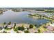 Picturesque aerial view of the waterfront community and stunning lake at 5205 Brighton Shore Dr, Apollo Beach, FL 33572