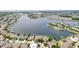 Picturesque aerial view of the waterfront community and stunning lake at 5205 Brighton Shore Dr, Apollo Beach, FL 33572