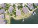 Aerial view of home on waterfront property with private dock at 5205 Brighton Shore Dr, Apollo Beach, FL 33572